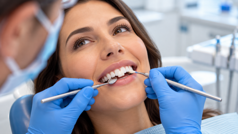 Dentist performing a tooth bonding procedure on a patient's front tooth
